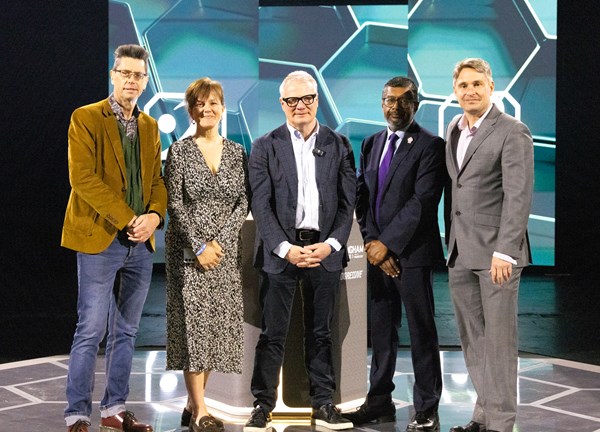 A photograph of Mayor Richard Parker standing alongside four key partners at an eSports event.