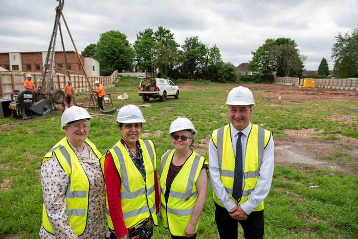 From L-R: Marie Lane, Chair of the Patient Participation Group; Cllr Jasbir Jaspal, Cabinet Member for Adults and Wellbeing, Tracy Dunne, Chair of the Rakegate Tenants and Residents Association, and Cllr Steve Evans, Deputy Leader and Cabinet Member for Housing, observe the start of the site investigation works at the Oxley site.