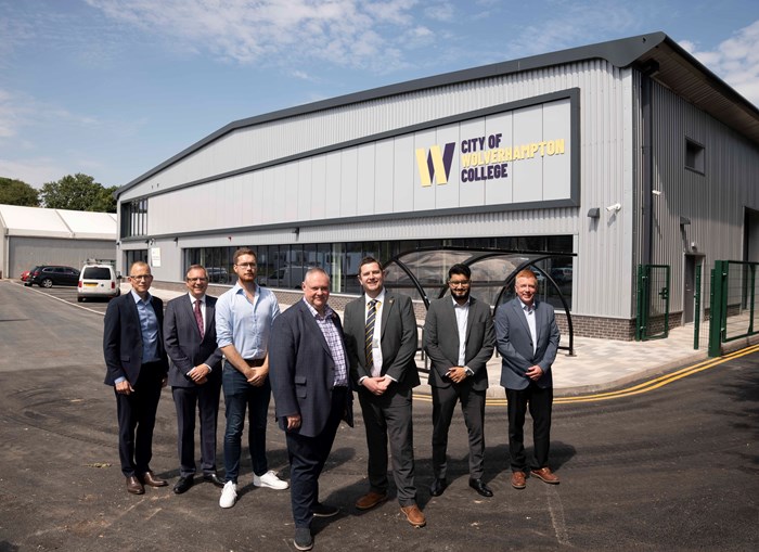 (L-R): Luke Pardoe, Turner & Townsend Associate Director;  Jonathan Astley, The Astley Partnership Architect; Cllr Chris Burden, City of Wolverhampton Council Cabinet Member for City Development, Jobs and Skills; Councillor Stephen Simkins, City of Wolverhampton Council Leader; Peter Merry, City of Wolverhampton College Deputy Chief Executive; Ravi Verma, Turner & Townsend Project Manager; and Rob Lashford, Speller Metcalfe Regional Director, in front of the new Advanced Technology and Automotive Centre