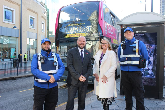 Transport minister Richard Holden with two TSOs and TfWM executive director Anne Shaw at the Smallbrook Queensway bus stop in Birmingham city centre