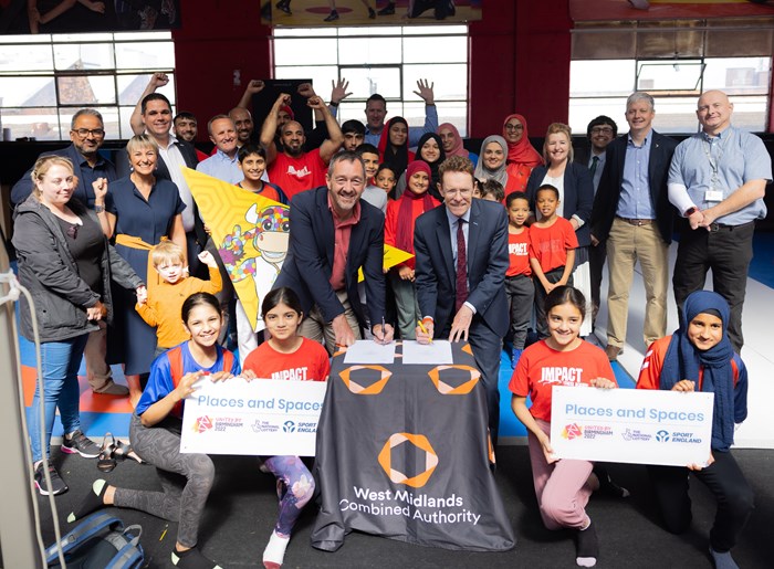 Chris Boardman, Sport England chair, and Andy Street, Mayor of the West Midlands and chair of the West Midlands Combined Authority (WMCA), sign the Memorandum of Understanding at Impact Fitness Academy in Tyseley, Birmingham.