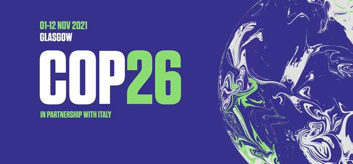 A promotional graphic for COP26 featuring the text "01–12 Nov 2021, Glasgow" above the large title "COP26", with "26" highlighted in green. Below, the text reads "In partnership with Italy". A stylised illustration of the Earth in white, green and dark blue fills the right-hand side of the image against a dark blue background.