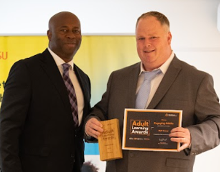 Dara McCarthy, RMF Group receiving the ALA Engaging Adults in Learning Award in 2023 from Nick Bailey