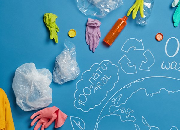 A drawing that says zero-waste, 100% natural and surrounded by recycled materials
