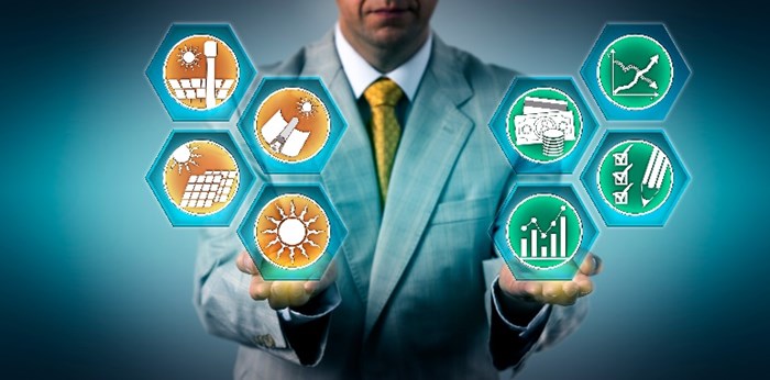 A Person In A Suit Holding Hexagons With Planning And Energy Icons Ai Generated