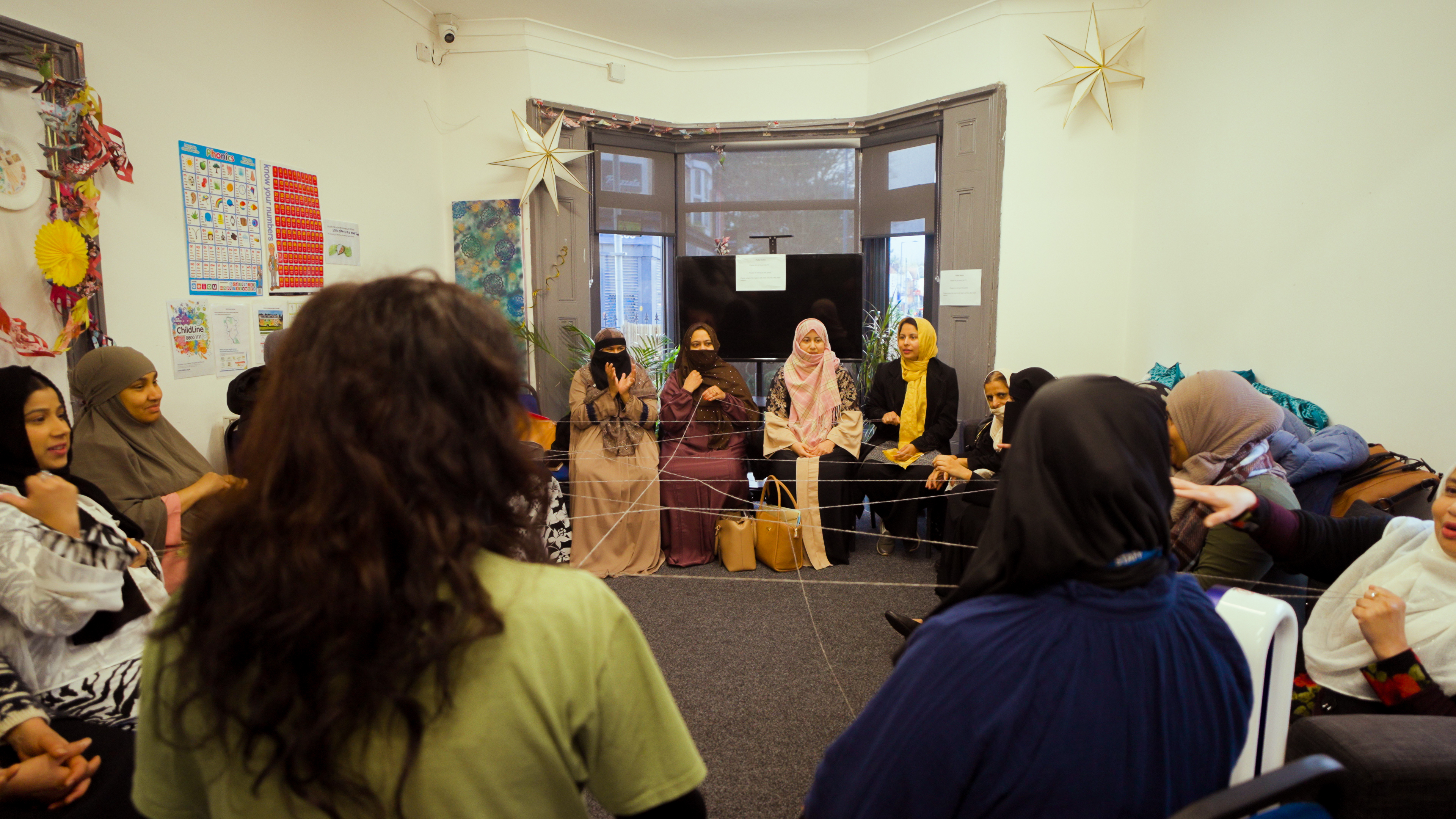 A group of women in a meeting 