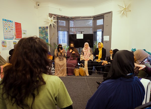 A group of women in a meeting 