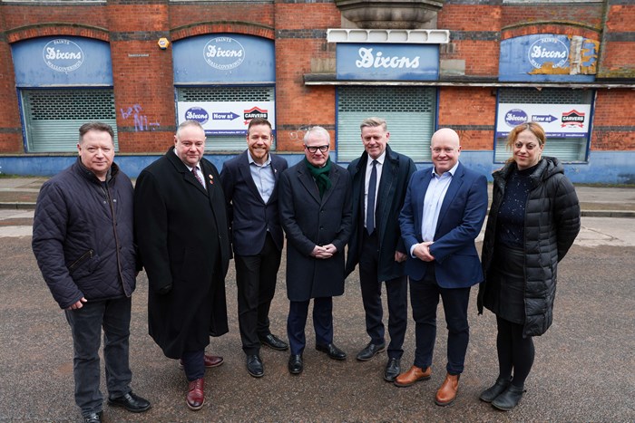 Left to Right: Gary Fulford, (CEO at whg), Cllr Stephen Simkins (Council Leader), Steve Bavington (CEO at YMCA Black Country Group), Richard Parker (Mayor of the West Midlands), Matt Moore (CEO at Morro Partnerships) Tim Dixon (Director of SJ Dixon & Son), Sally Cowan (Chief Operations Officer (Places) at YMCA Black Country Group) outside Dixon House