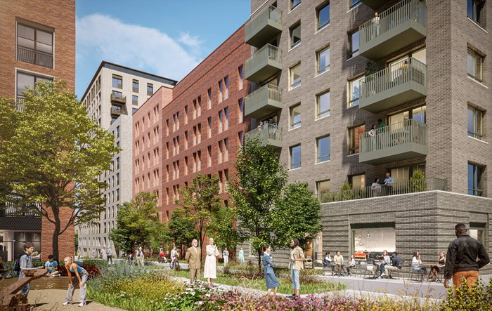 Row of modern low rise aparment blocks with trees, landscaping and people milling about in front
