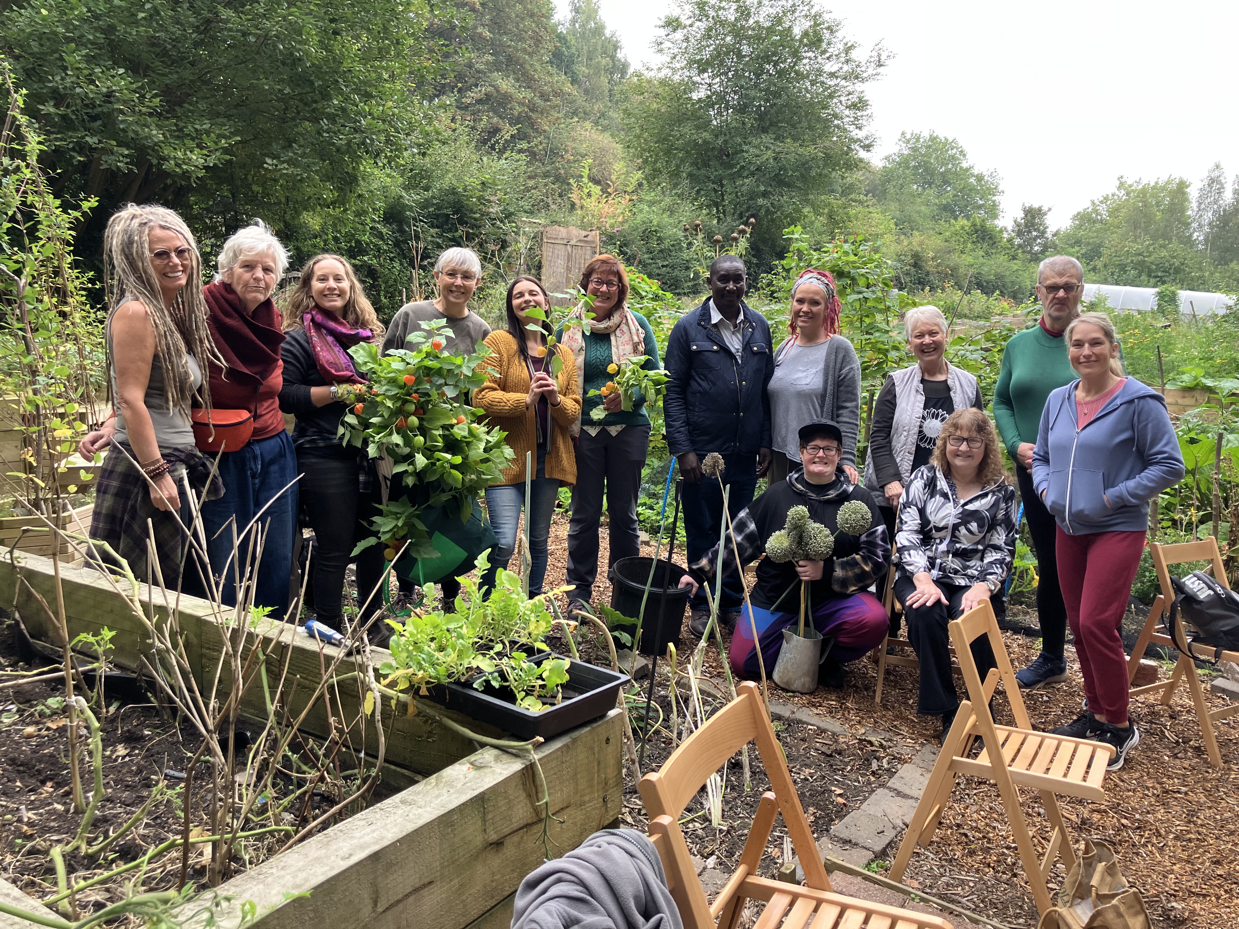A group of people at an allotment 