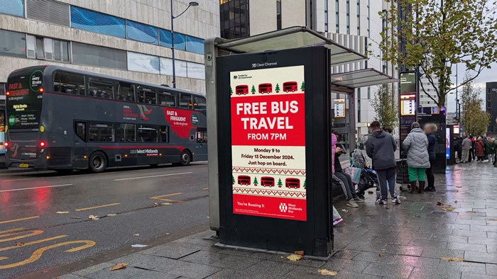 Bus stop advertising graphic of free bus travel offer